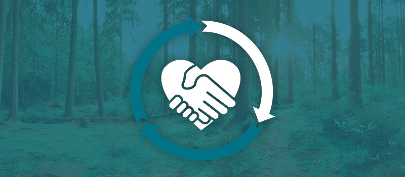 Ikon som föreställer två händer som skakar hand och bildar ett hjärta.